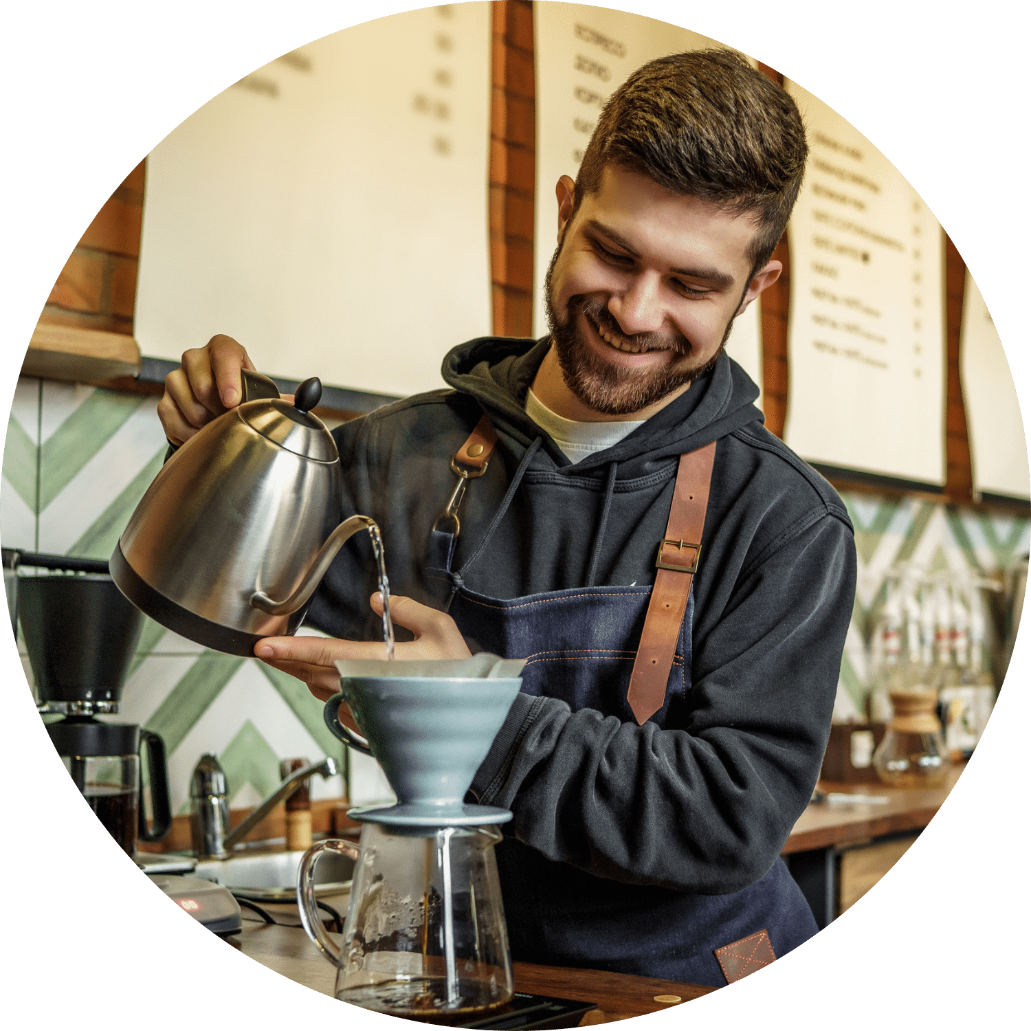 Barista Pouring Hot Water Male barista pouring hot water to brew coffee